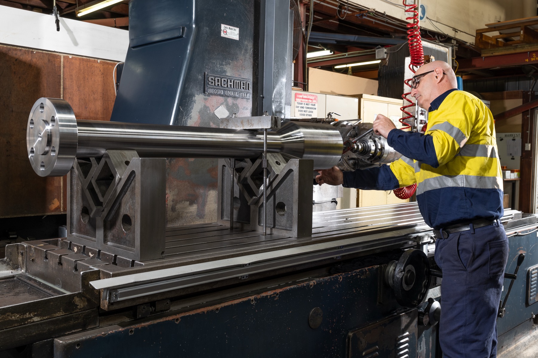 ACR North machinist setting up a precision shaft in the machine shop