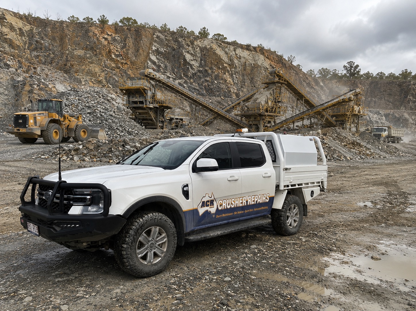 ACR North service ute in a quarry with crushing and screening plant behind
